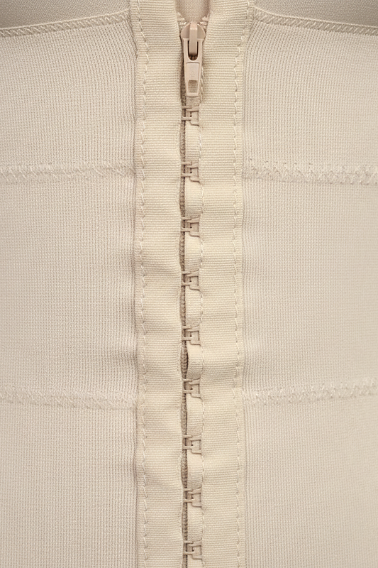 High-compression bodysuit, fabric detail.