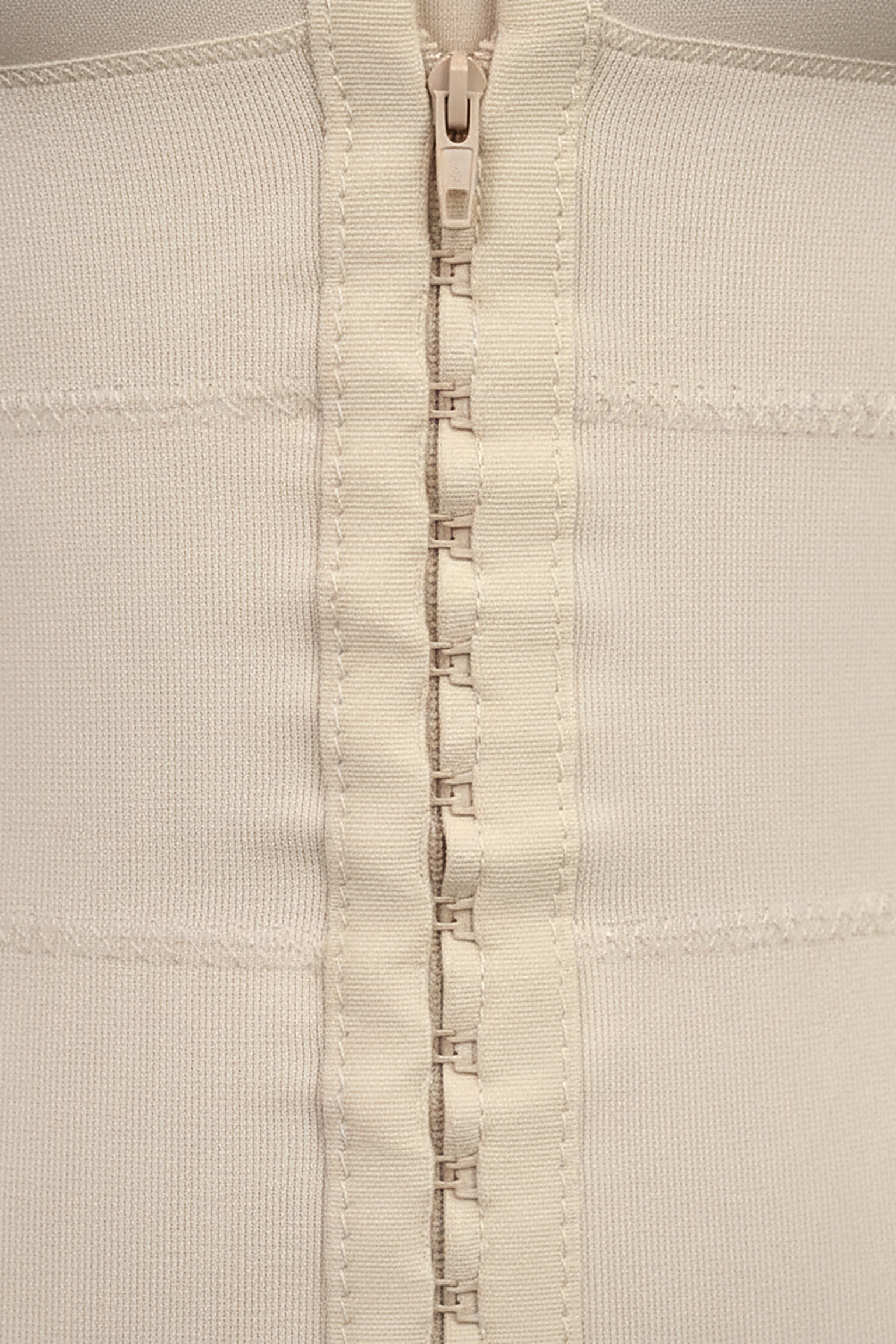 High-compression bodysuit, fabric detail.