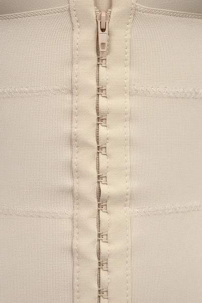 High-compression bodysuit, fabric detail.