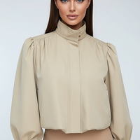Womens beige trench coat, pocket detail.