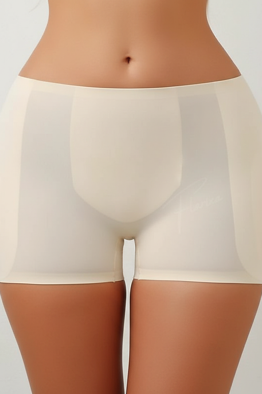 Shapewear panties with hip pads, fabric detail.