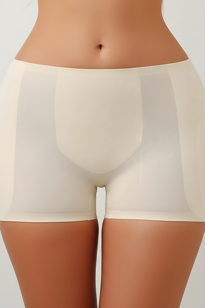Shapewear panties with hip pads, fabric detail.