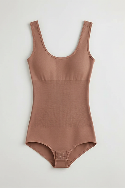 Solid one-piece garment, profile view on model.