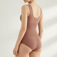 Solid one-piece garment, back view on model.