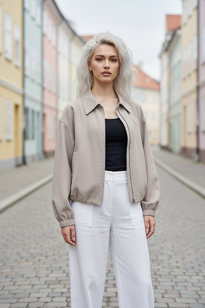 Beige short jacket, fabric texture detail.