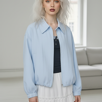 Beige short jacket, pocket detail.