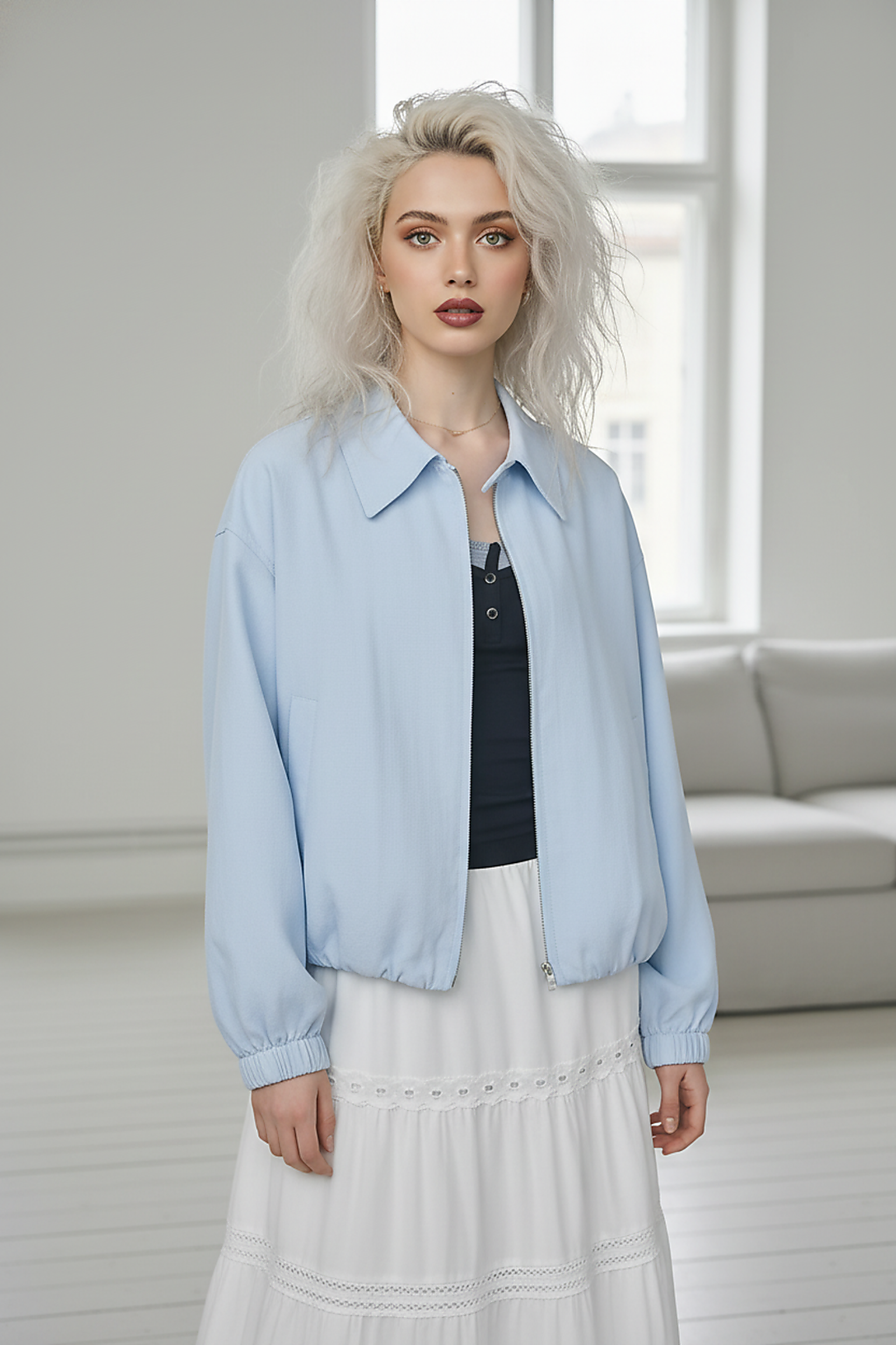 Beige short jacket, pocket detail.