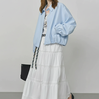 Beige short jacket, collar detail.