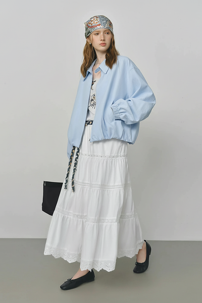 Beige short jacket, collar detail.