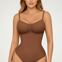 Spandex thong bodysuit, angled view on model.