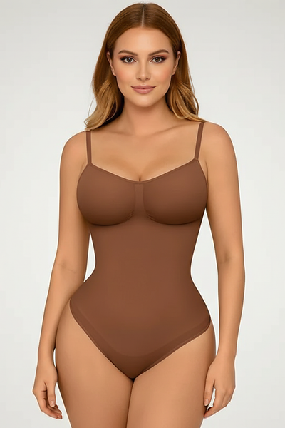 Spandex thong bodysuit, angled view on model.