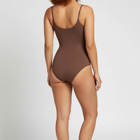 Spandex thong bodysuit, back view on model.