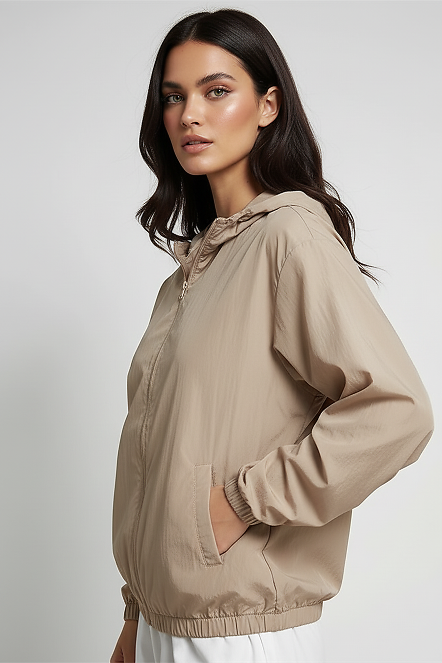 Orange transparent hooded jacket, hood detail with drawstrings.