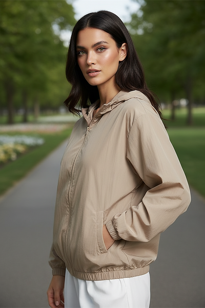 Orange transparent hooded jacket, zipper and hood detail.