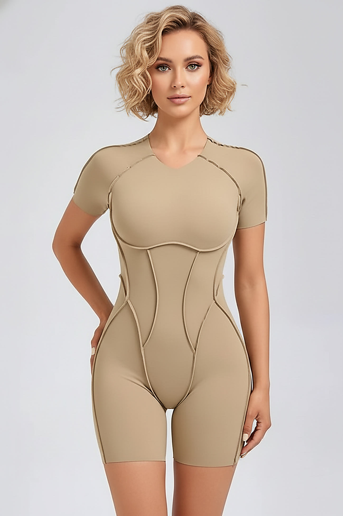 Black workout jumpsuit, alternate angle view on model.