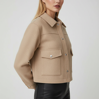 Solid long-sleeve jacket, full length front view.