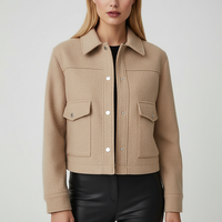 Solid long-sleeve jacket, interior lining detail.