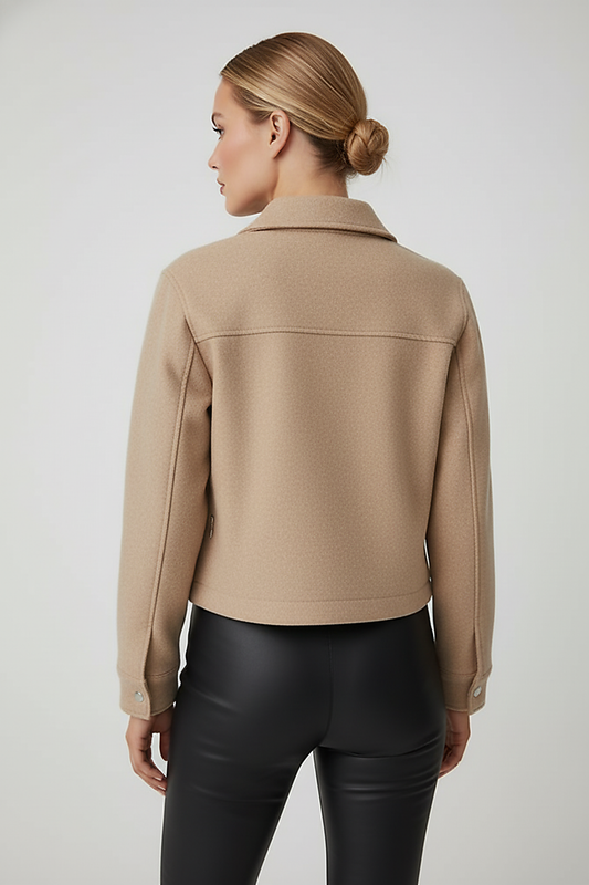 Women's solid long-sleeve jacket, back view on model.