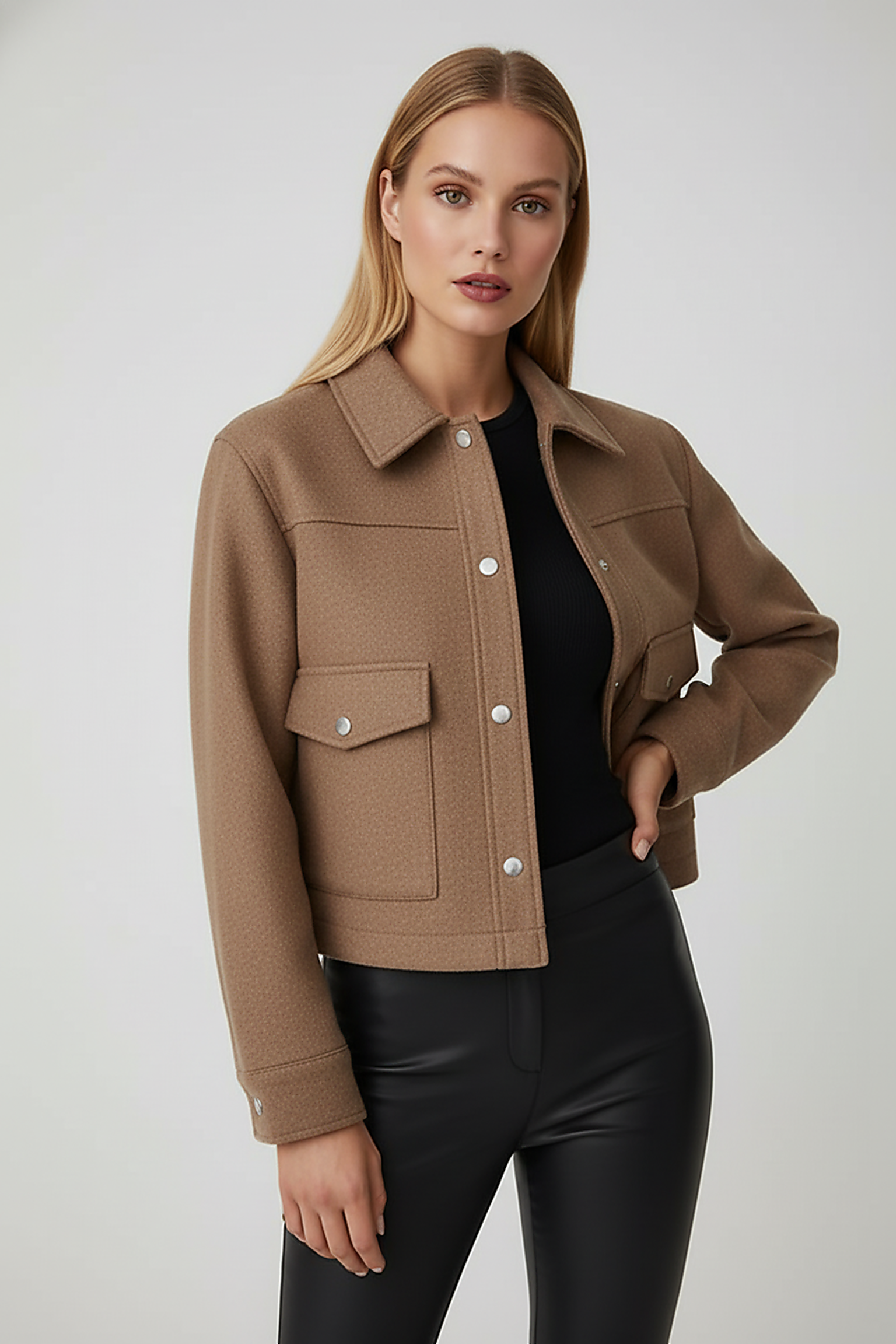 Solid long-sleeve jacket cuff detail.