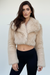 Cropped faux fur jacket, snap button closure detail.