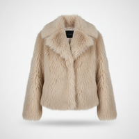 Cropped faux fur jacket, angled back view on model.