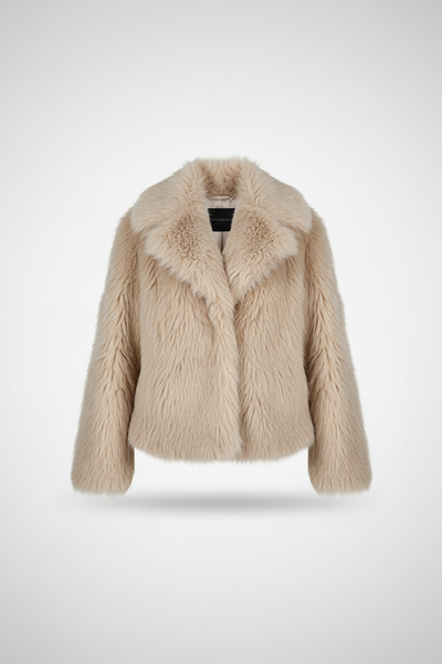 Cropped faux fur jacket, angled back view on model.