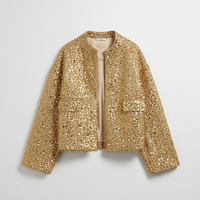 Gold sequin jacket, back view on model.