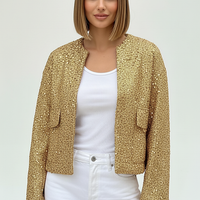 Gold sequin jacket, side view on model.