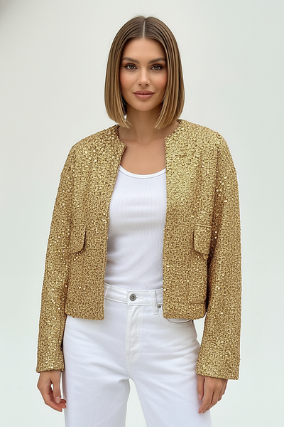 Gold sequin jacket, side view on model.