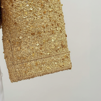 Gold sequin jacket, fabric detail.