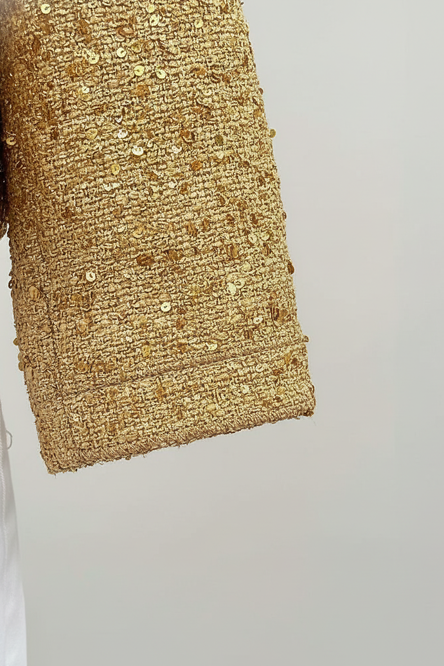 Gold sequin jacket, fabric detail.