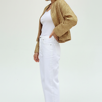 Gold sequin jacket, front view on model, different pose.