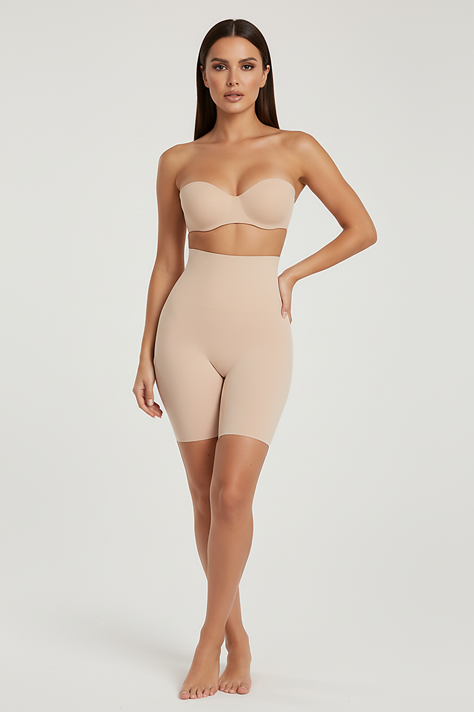 High-waist cotton blend shapewear shorts, angled view on model.