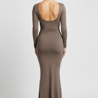 Solid long sleeve backless bodycon maxi dress, front view on model.