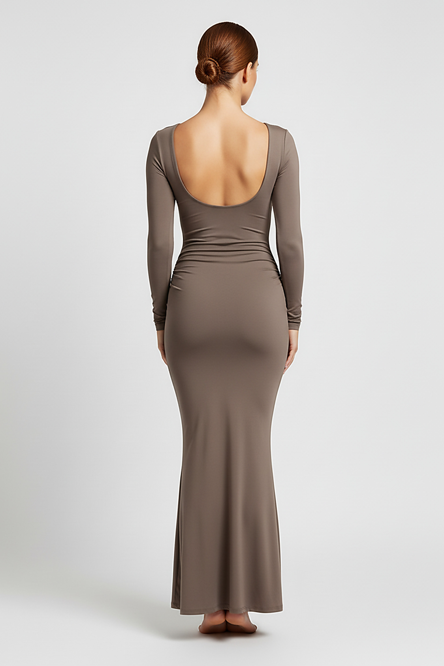 Solid long sleeve backless bodycon maxi dress, front view on model.