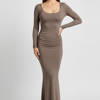 Elegant solid Y2K long sleeve backless bodycon maxi dress, front view on model.
