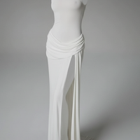 White sleeveless high-slit turtleneck maxi dress, on model.