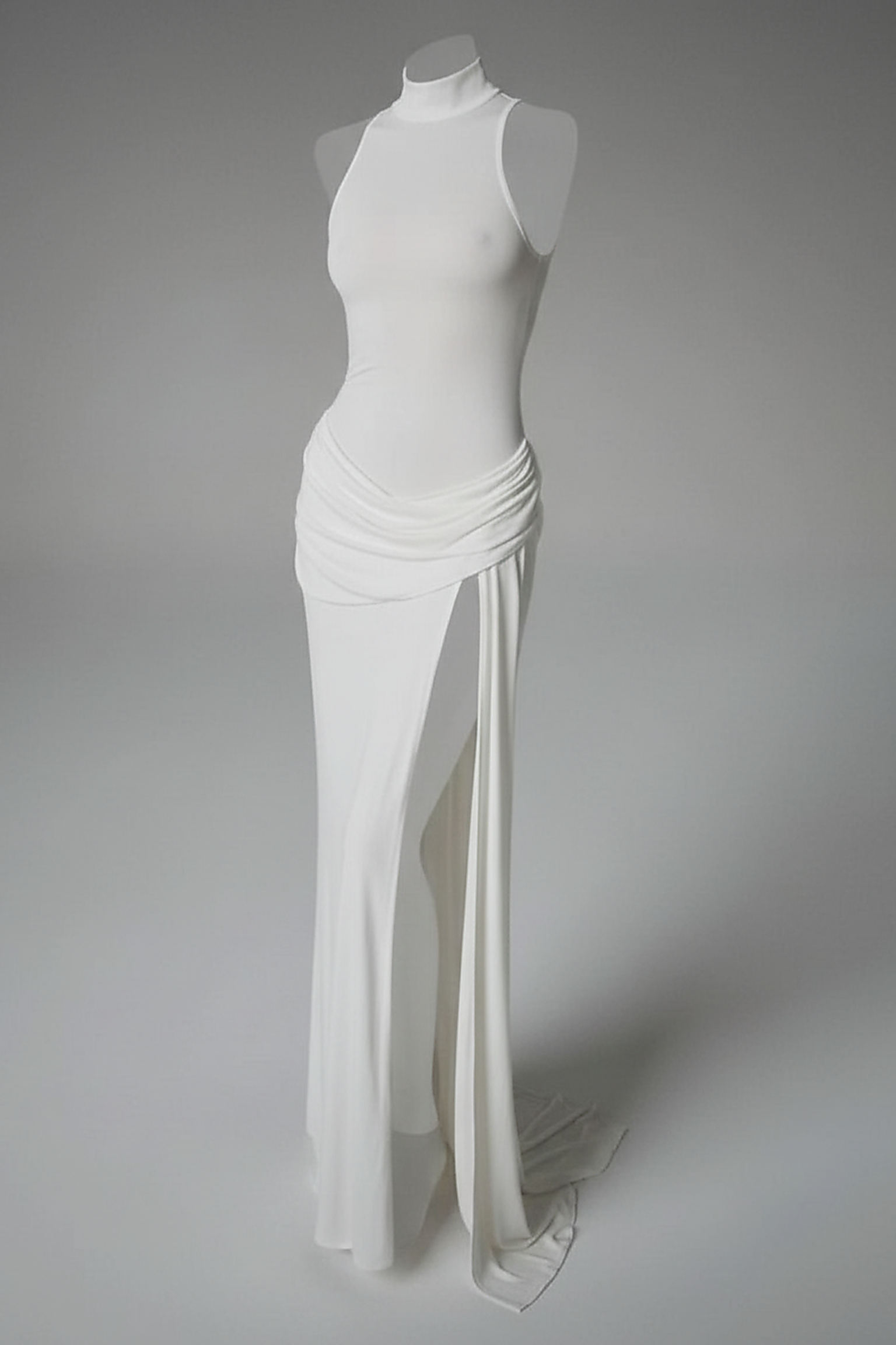 White sleeveless high-slit turtleneck maxi dress, on model.