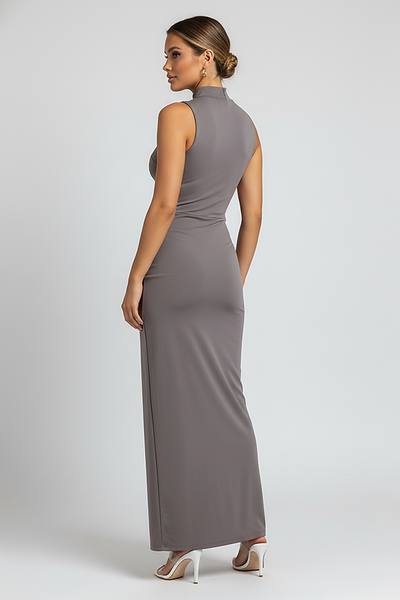 White elegant sleeveless high-slit turtleneck maxi dress, on model.