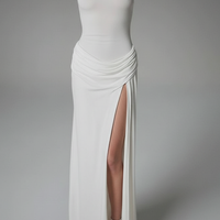 White elegant sleeveless high-waist turtleneck maxi dress, on model.