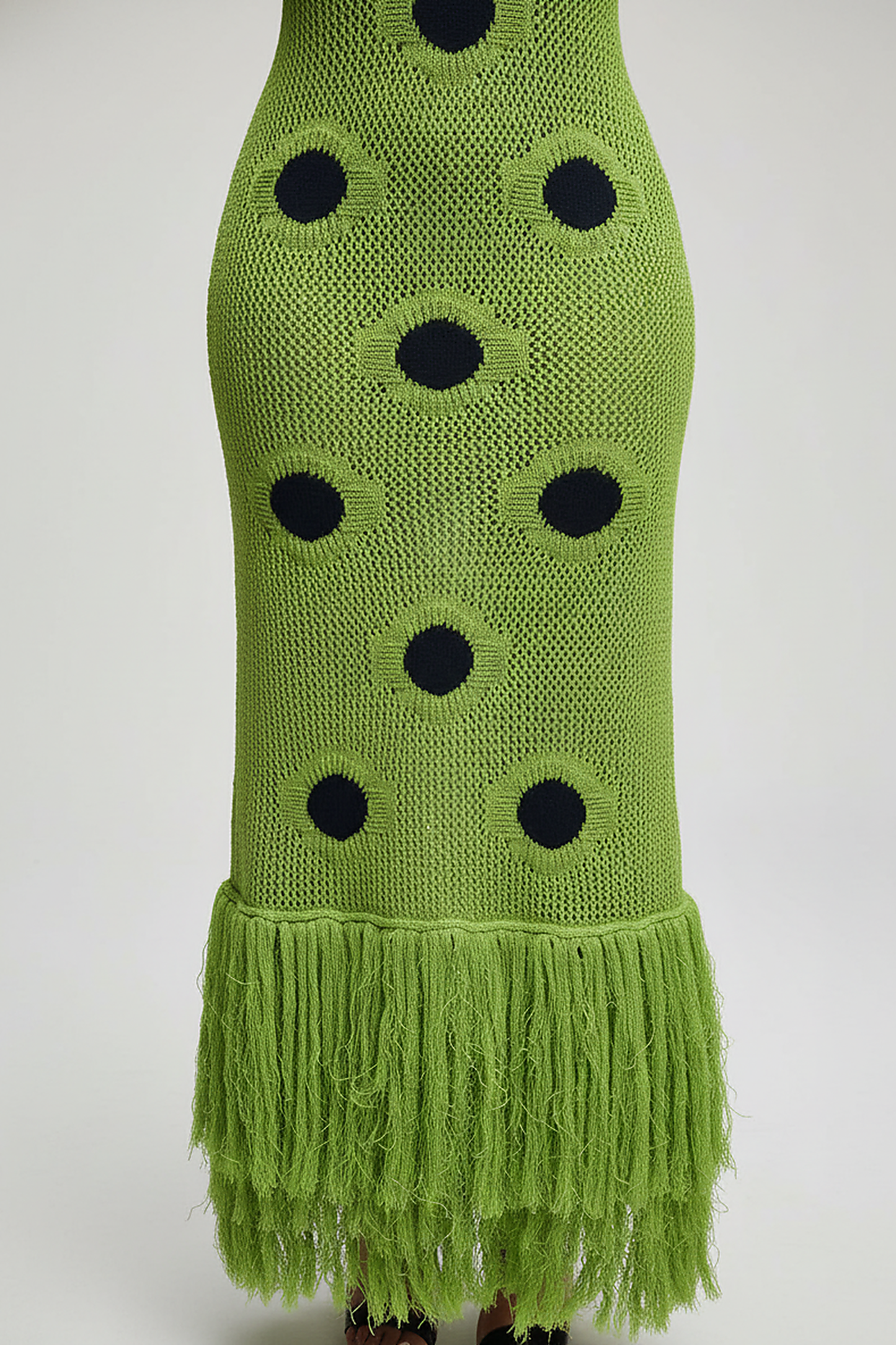 woman wearing white knitted maxi cover-up dress, front view, standing, hands relaxed