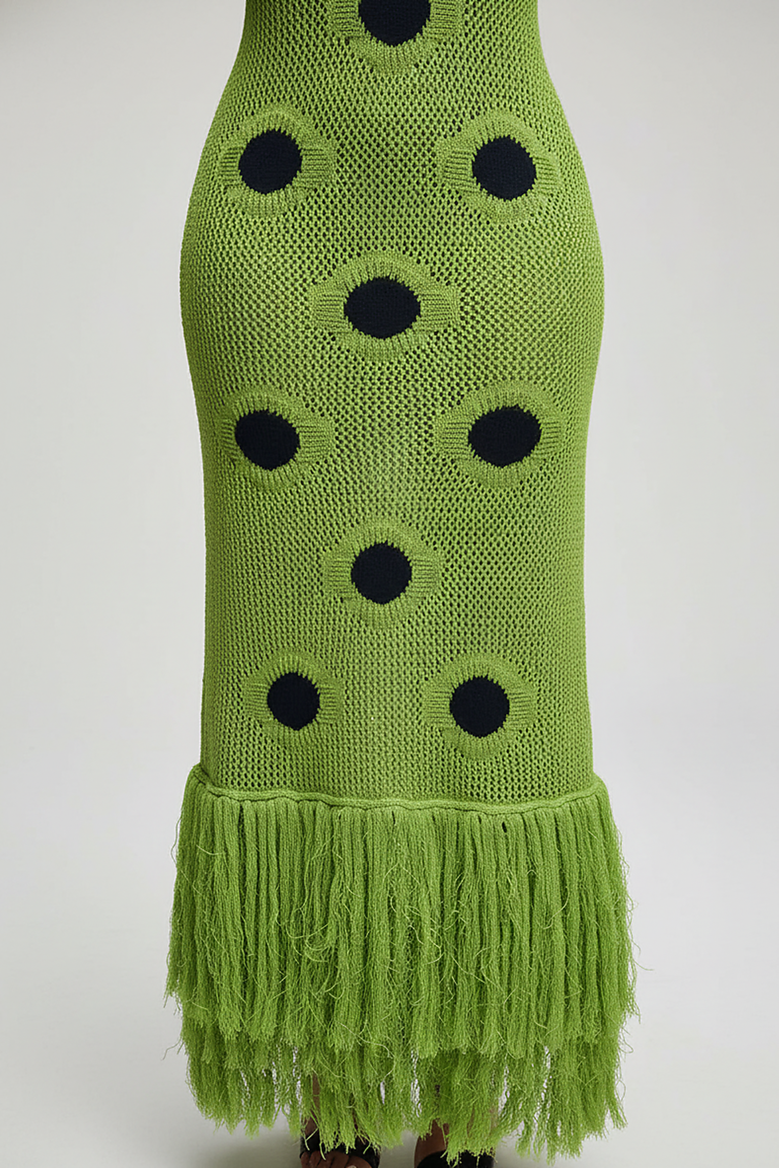 woman wearing white knitted maxi cover-up dress, front view, standing, hands relaxed