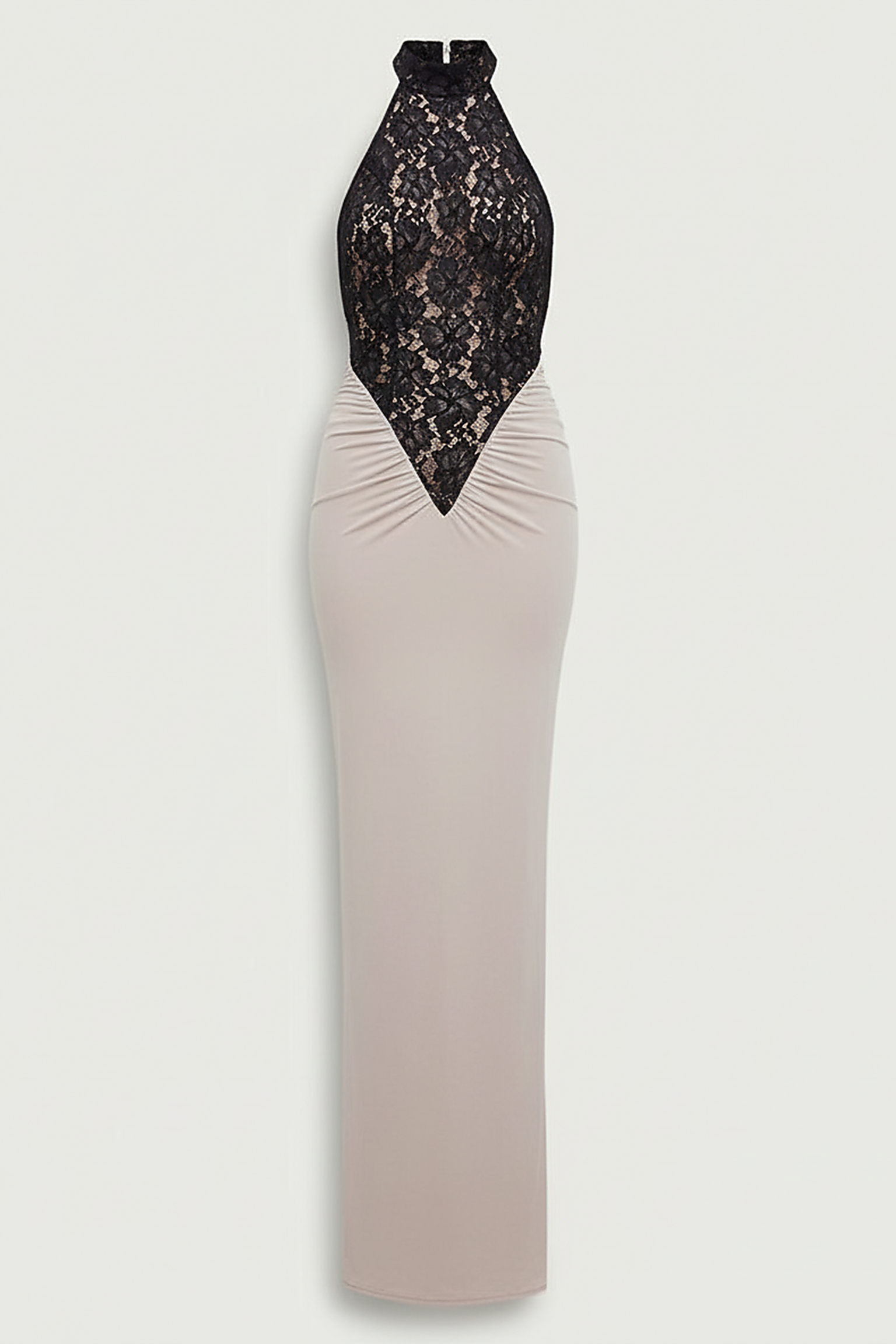 Front view of a woman wearing a black halterneck maxi dress with a sheer lace bodice, accessorized with sunglasses and a gold bracelet.; Model posing in a black lace halterneck evening gown,