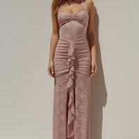 Black maxi dress, hemline detail.