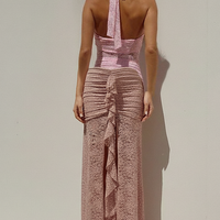 Black ruched maxi dress, side view on model.