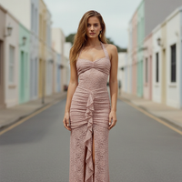 Black maxi dress, ruched fabric detail.