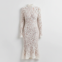 White lace bodycon dress with mock neck, front view on model.