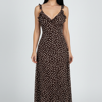 Polka dot layered sleeveless suspender dress, front view on model.