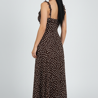 Trendy polka dot layered suspender sundress, front view on model.
