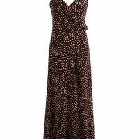 Women's layered polka dot suspender sundress, front view on model.